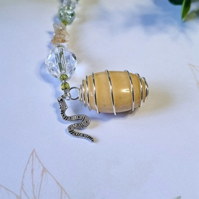 Serpent Keeper Charm – (ID: akc13)