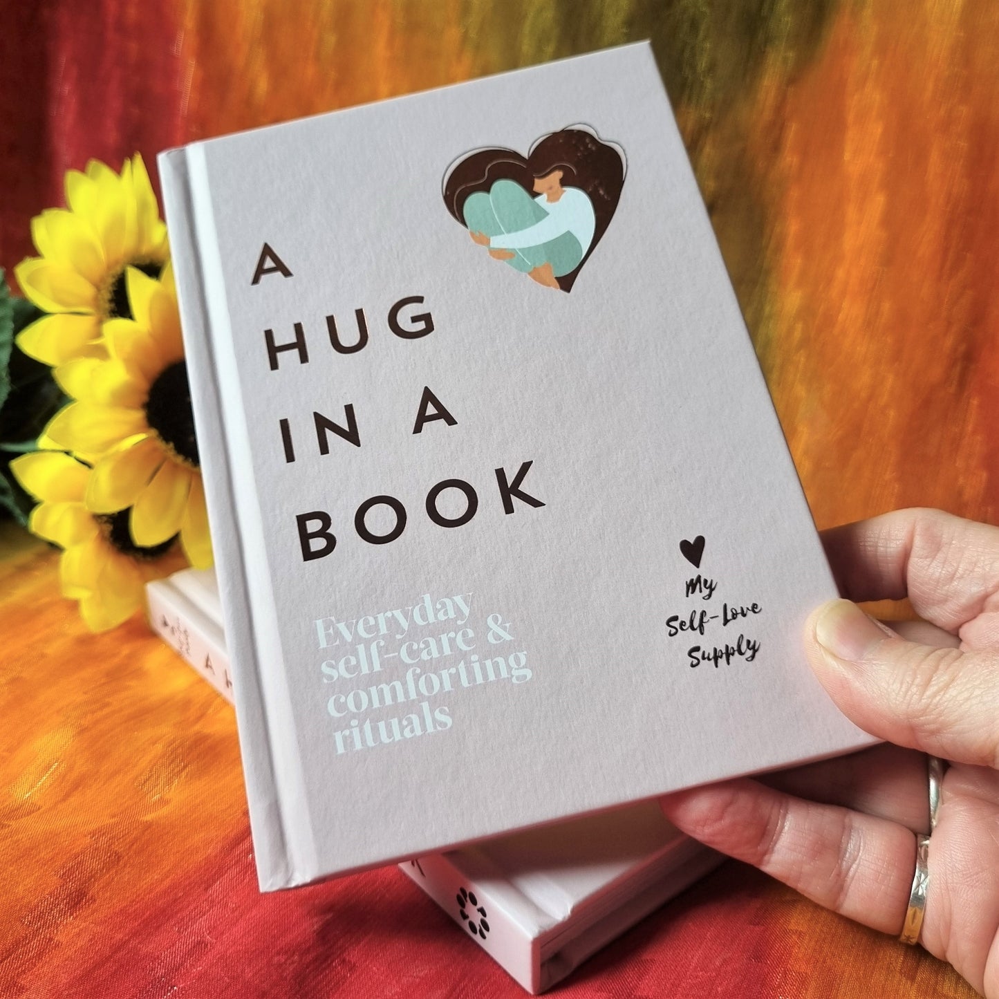 ‘A Hug in a Book’  by  Sofia Pellaschiar  -  (ID: bc12)